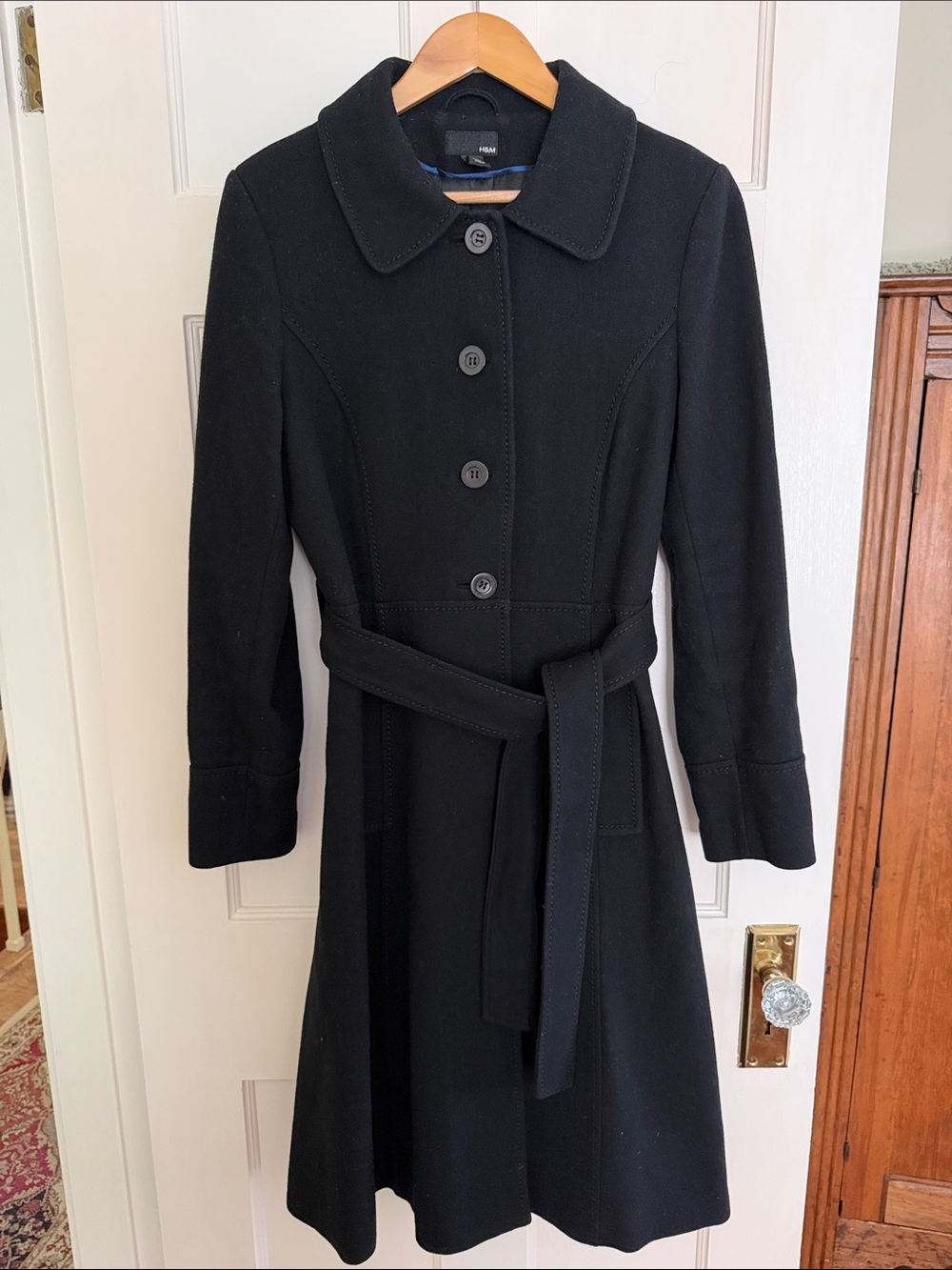 H&M black wool fit and flare coat. Size 12.